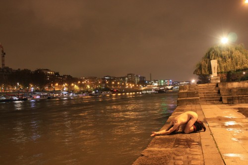  the dock of La Rapée on Seine river with Austerlitz bridge in the back and a bateau mouche